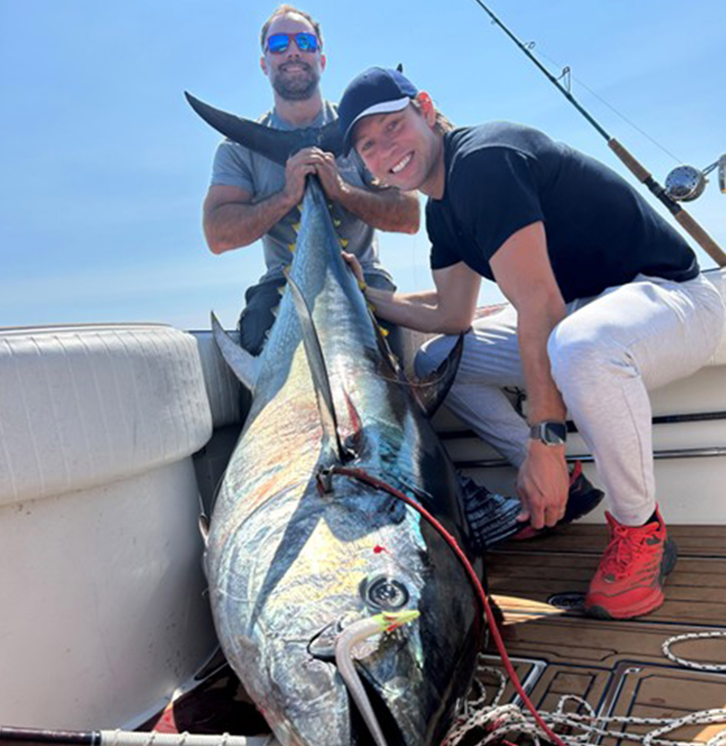 Two men with a big fish Two men with a big fish